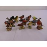 Twelve Beswick porcelain figurines of various birds