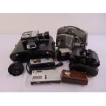 A quantity of photographic equipment to include a movie projector, movie camera and binoculars
