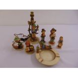 A quantity of Hummel and Goebel figurines of children to include a table lamp (7)