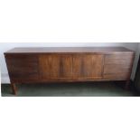 An Archie Shine rosewood rectangular sideboard with hinged doors on four rectangular legs, CITES