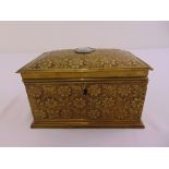 A rectangular brass chest with hinged cover set with Jasperware plaque