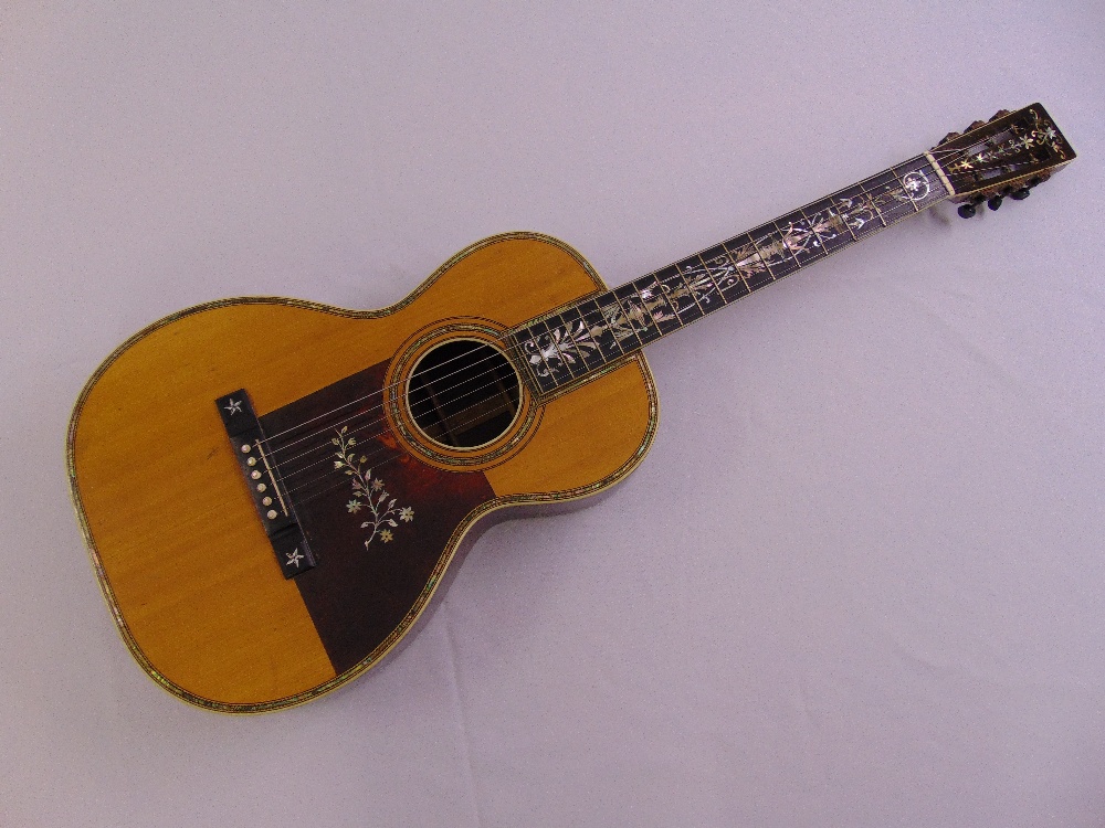A very rare Larson Brothers guitar stamped and dated 1904, the body and neck inlaid with mother of