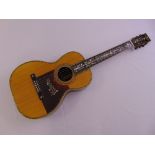 A very rare Larson Brothers guitar stamped and dated 1904, the body and neck inlaid with mother of