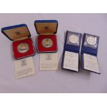 Two silver proof 1977 coins in original fitted cases and two silver Israeli 32nd Independence Day