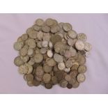 A quantity of pre 1947 silver coins to include half crowns, florins, shillings, sixpences and