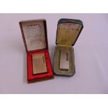 S.T. Dupont cigarette lighter in fitted case and a Dunhill cigarette lighter in fitted case