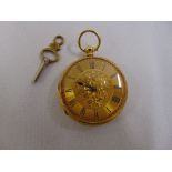 An 18ct gold pocket watch with Roman numerals to include key