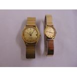 An Omega Seamaster quartz with date gentlemans wristwatch and an Omega Geneve ladies wristwatch