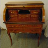 A French style Kingswood inlaid Bonheur of rectangular form with roll top revealing inlaid drawers