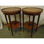 A pair of circular side tables with gilt metal gallery, on four tapering rectangular legs