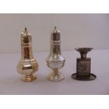 Two silver sugar castors and an Israeli white metal match holder