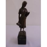 H. Henjes bronze figurine of a young girl holding a chicken on rectangular plinth