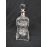 Aspreys glass decanter of waisted rounded rectangular form with drop stopper and plain silver