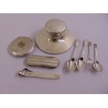 A quantity of silver to include a compact with regimental crest, capstan inkwell, spectacle case,