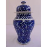 Chinese blue and white vase and cover decorated with flowers and leaves