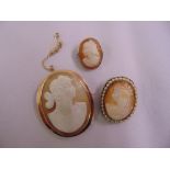 Three cameo brooches, one set in 9ct gold