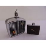 A decanter in the form of a car grill and a hip flask with a Jaguar cars applied chrome logo