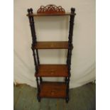 A mahogany inlaid four tier whatnot of rectangular form with turned supports