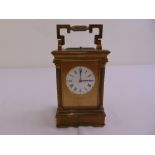 D. Schwarck and Son of Leamington brass repeating carriage clock of customary form the enamel dial