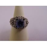 A white gold diamond and cabochon sapphire articulated ring, gold tested 18ct, approx total weight