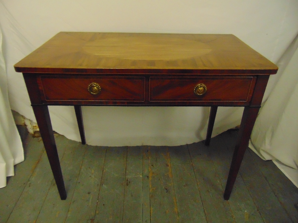 A 19th century inlaid library table inlaid with satinwood banding, two drawers on tapering