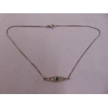 Art Deco style diamond and emerald necklace, chain hallmarked 9ct, approx total weight 4.9g