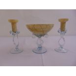 An art glass centre piece to include a central bowl flanked by a pair of candlesticks