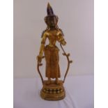 A gilt metal figurine of a Buddhist deity on raised lotus base, 89cm (h)