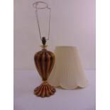 A Murano red glass table lamp with silk shade