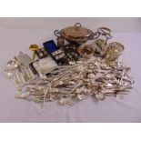 A quantity of silver plate to include a tureen and cover, cased napkin rings, coasters and flatware