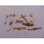 A quantity of 9ct gold jewellery to include brooches, pendants and pins, approx total weight 23.