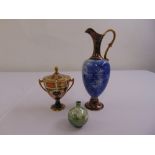Royal Crown Derby Imari pattern two handled cup and cover, a Royal Doulton jug and a vase