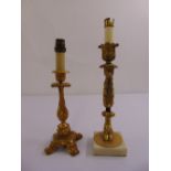 Two gilt metal table lamps, one mounted on marble base