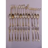 A quantity of continental white metal, silver and silver plated flatware