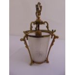 A gilt metal and frosted glass hall lantern