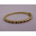 9ct yellow gold diamond and sapphire bangle, approx total weight 22.7g