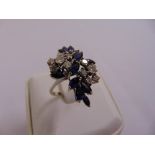 A white gold, diamond and sapphire cocktail ring, gold tested 14ct, approx total weight 7.5g