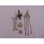 A quantity of silver and white metal to include a Chatelaine, a childs rattle, watch chain and a