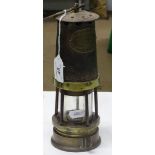 A brass mounted miner's lamp by John Davis & Son (