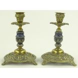 Pair of Victorian cast brass and Doulton candlesti