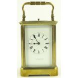 A French brass cased carriage clock, with 8 day re