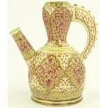 A Zsolnay Pecs ewer, relief moulded arabesque desi