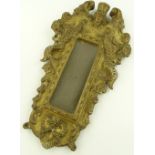 A Venetian carved giltwood and gesso wall mirror,