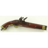 A 19th century flintlock pistol, brass mounts, loc