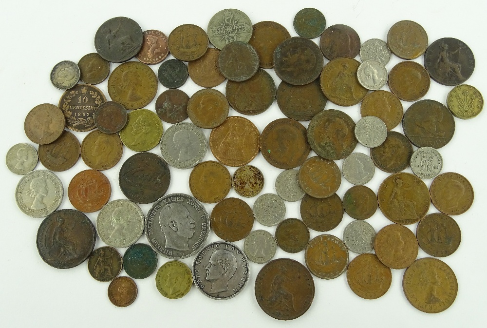 A group of silver and other coins.