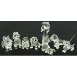 A group of Swarovski crystal dogs, boxed, (8).