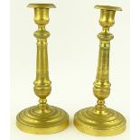 Pair of French Empire style gilt brass candlestick