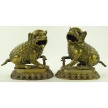 A pair of Chinese bronze dogs of fo, height 17cm,