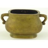 A Chinese bronze 2-handled censer of bulbous recta