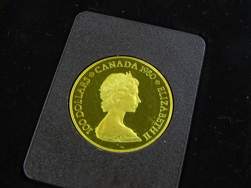 A 22ct gold Canada 1980 100 dollar proof coin, 16. - Image 2 of 3